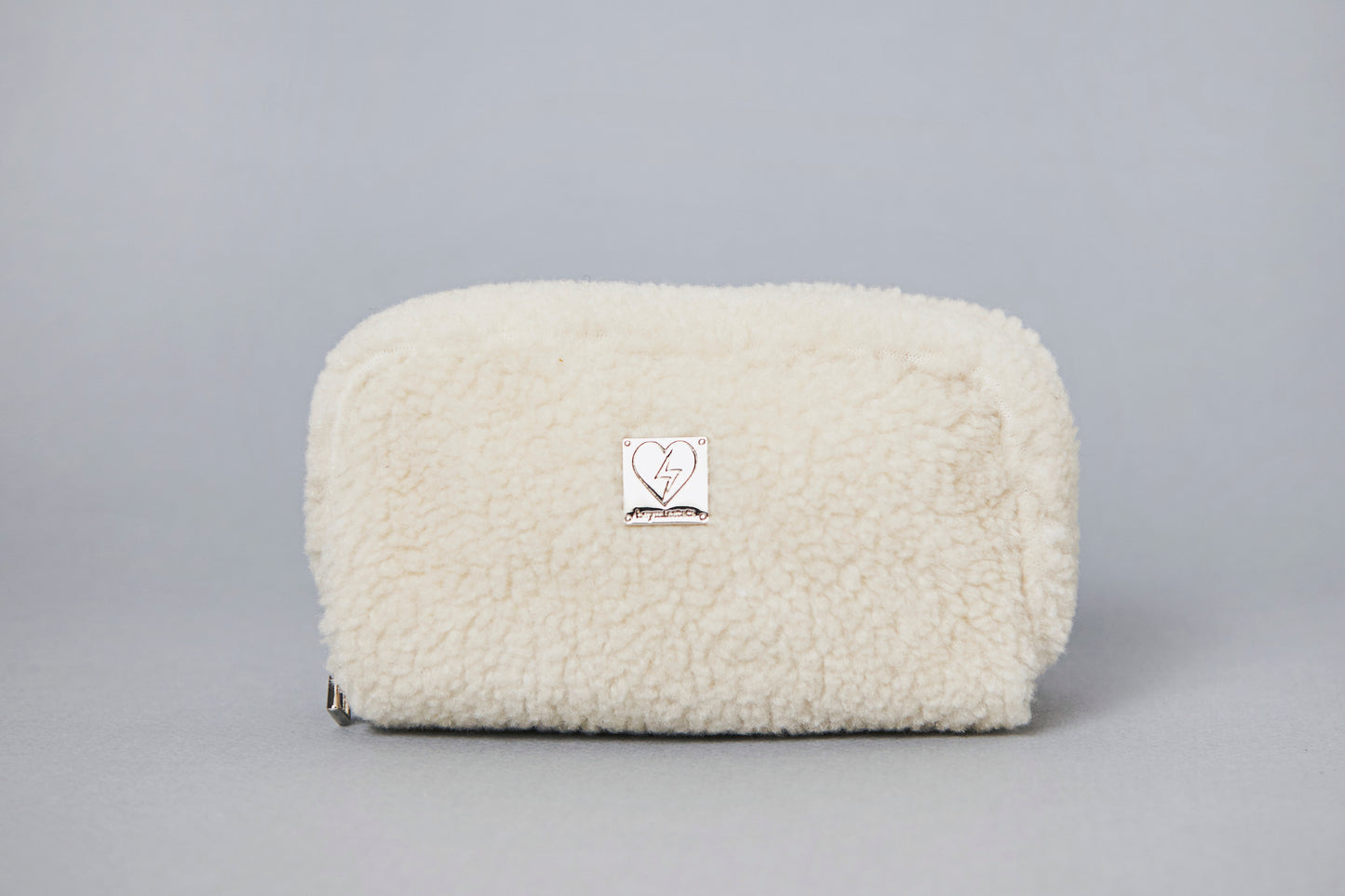 ivory shearling pouch