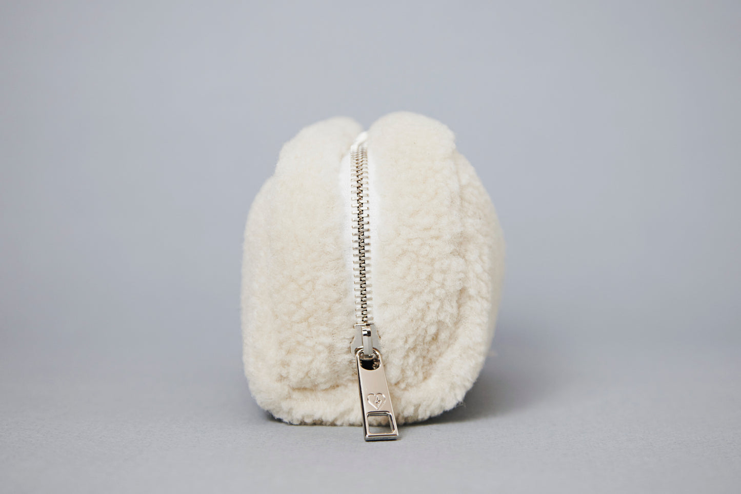 ivory shearling pouch